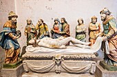 France, Finistere, Lampaul Guimiliau Parish close, Notre Dame church, burial of Jesus, 17th century polychrome stone statue
