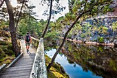 France, Cotes d'Armor, Erquy, the Blue Lakes are remains of former quarries of pink sandstone, hike on the GR 34 hiking trail