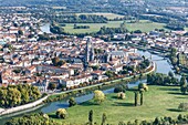 France, Charente Maritime, Saintes, St Peter's cathedral and the city on the Charente river (aerial view)