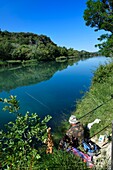 France, Alpes de Haute Provence, Parc Naturel Regional du Verdon (Natural Regional Park of Verdon), Greoux les Bains, trout fishing on the banks of the Verdon river