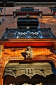 France, Haute-Garonne, Toulouse, listed at Great Tourist Sites in Midi-Pyrenees, Jules de Russeguier street, entrance and facade of a mansion at sunset