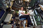 France, Var, Toulon, the naval base (Arsenal), Commander Nicolas Faure at periscope in the central navigation and operation room, Commander of the nuclear attack submarine (SNA) Casabianca (Rubis type)