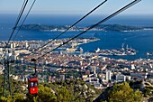 France, Var, Toulon, the Rade (Roadstead), cable car from the Mont Faron, the dry docks of the Grands Bassins Vauban from the naval base (Arsenal) and the peninsula of Saint Mandrier in the background