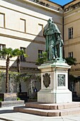 France, Corse du Sud, Ajaccio, in the pedestrian street Cardinal Fesch, the palace Fesch museum of fine arts and the statue of the cardinal in the inner courtyard