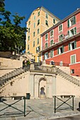 France, Haute Corse, Bastia, the colorful facades of the Romieu staircase that allows to climb from the old port to the citadel