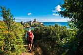 France, Cotes d'Armor, Plevenon, hike on the GR 34 hiking trail, Fort la Latte in the background