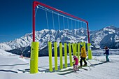France, Haute Savoie, Massif of the Mont Blanc, the Contamines Montjoie, on the ski slopes in family in the ludo park and the highest summit of Europe,