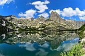 France, Haute Corse, Corte, Restonica Valley, in the Regional Natural Park Lake Melo and from left to right, the peaks of the 7 lakes, Capitello and Lombardiccio
