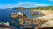 France, Corse du Sud, Campomoro, Tizzano, hiking on the coastal path of the reserve, Senetosa, the panoramic view of these granite chaos is striking at sunset