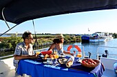 France, Herault, Villeneuve les Maguelone, Canal du Rhone in Sete, boat rental The Boat, breakfast
