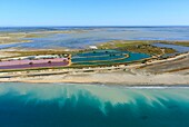 France, Bouches du Rhone, Camargue Regional Natural Park, Saintes Maries de la Mer, Raft Drop, Decantation Pool, Pointe de Jean Place and Imperial Pond in the background (aerial view)