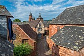 France, Correze, Dordogne Valley, Collonges la Rouge, labelled Les Plus Beaux Villages de France (The Most Beautiful Villages of France), village built in red sandstone, bell tower Saint Pierre church