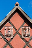 France, Haut Rhin, Route des Vins d'Alsace, Eguisheim labelled Les Plus Beaux Villages de France (One of the Most Beautiful Villages of France), facade of a traditional house in Remparts street