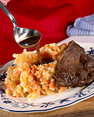 Mashed carrots and potatoes with gravy