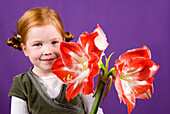 Girl holding Hippeastrum