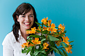 Woman holding Alstroemeria