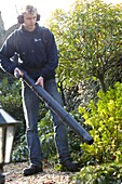 Man handling blade blower