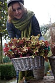 Woman holding Heuchera