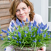 Woman holding Muscari