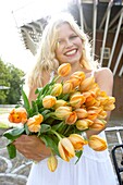 Woman holding tulips