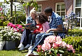 Family relaxing in garden