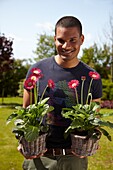 Man holding gerbera