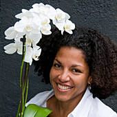 Woman holding Phalaenopsis 