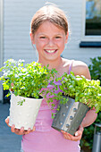 Girl holding herbs