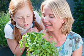 Womand and child with herbs
