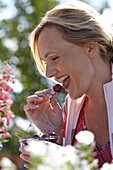 Woman eating cherry