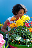 Woman enjoying spring container