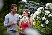 Couple in rose garden