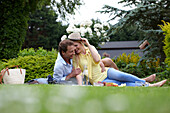 Couple relaxing in garden