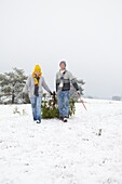 Couple with christmas tree