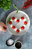 Heart of cherry tomatoes and mini mozzarella