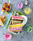 Four different colourful sandwiches for children