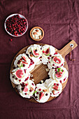 Meringue wreath with cranberry confit and mascarpone cream, decorated with figs