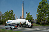 Tanker lorry transporting LPG passing oil refinery