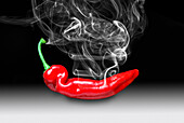 Red chilli releasing smoke, illustration