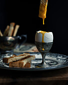 Soft boiled eggs with soldiers