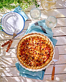 Tart with feta cheese, courgette and hazelnuts