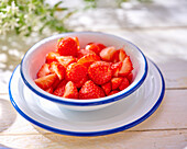 Sliced ​​strawberries in small bowls
