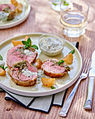 Stuffed milk-fed lamb with herb sauce