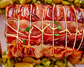 Stuffed cod wrapped in bacon