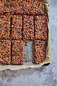 Gluten-free muesli bars made from rolled oats, nuts and seeds