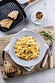 Creamy scrambled eggs and toasted bread
