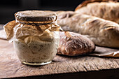 Fresh rye sourdough in a jar