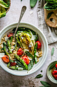 Braised romaine with quinoa, green asparagus and cherry tomatoes