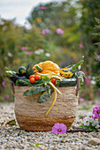 Vegetable basket and small bunch of jewellery baskets and lemon balm