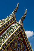 Detail of the Phra Vihara Yod Chapel by the Temple of the Emerald Buddha at the Grand Palace complex in Bangkok, Thailand.